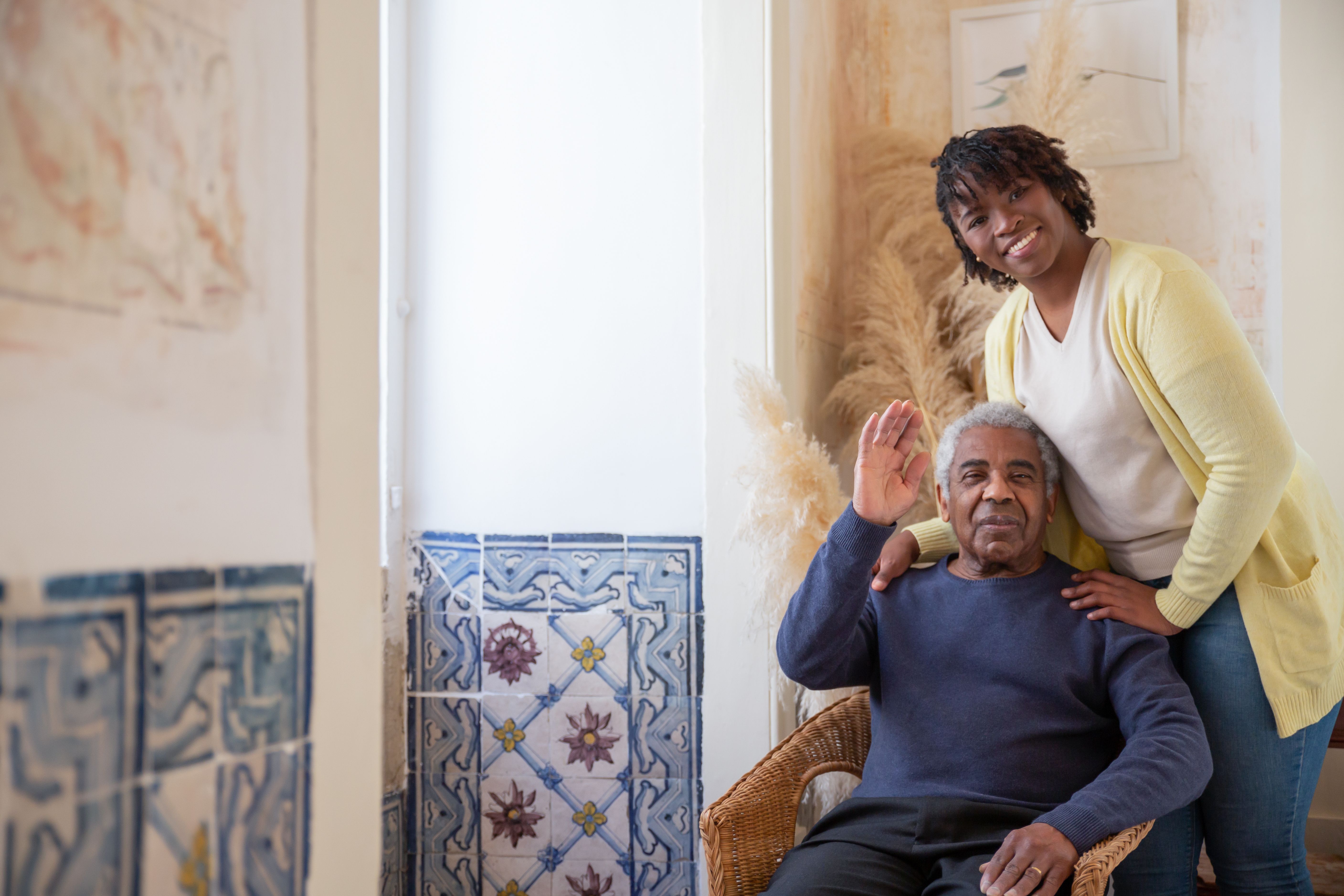 Two people sharing a warm conversation in comfortable chairs